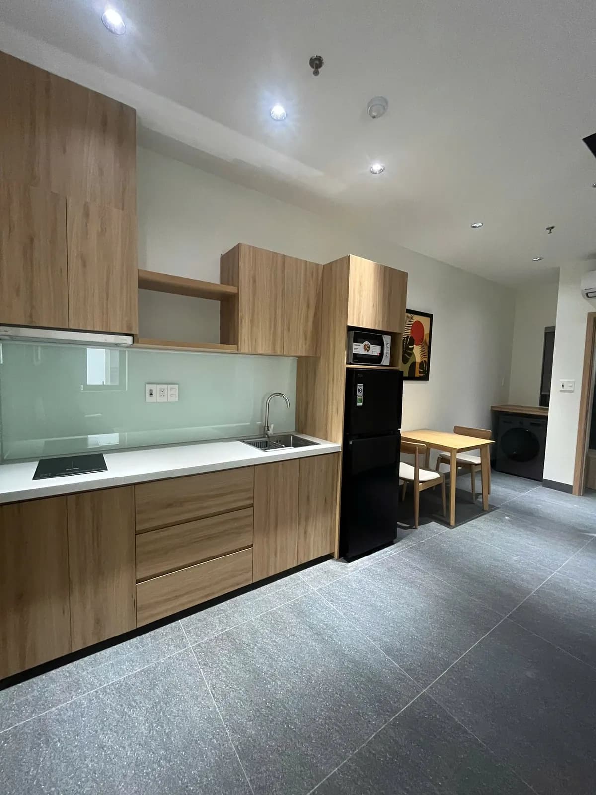 Studio rental apartments — light oak palette — 2