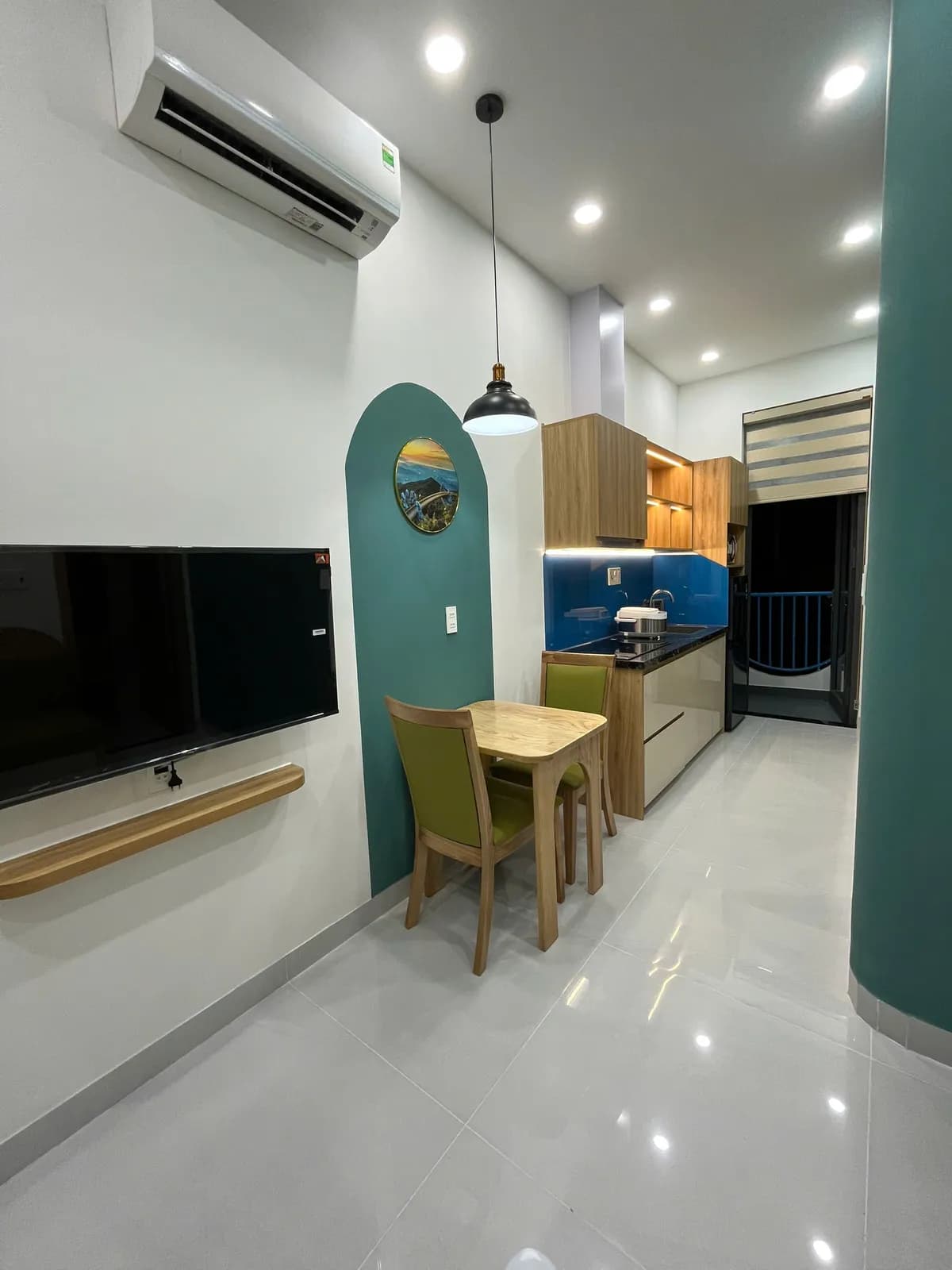 Studio apartments — green accents & arched details — 6